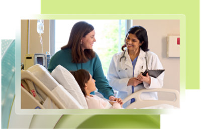  Patient in hospital bed with IV, accompanied by a visitor and a doctor.