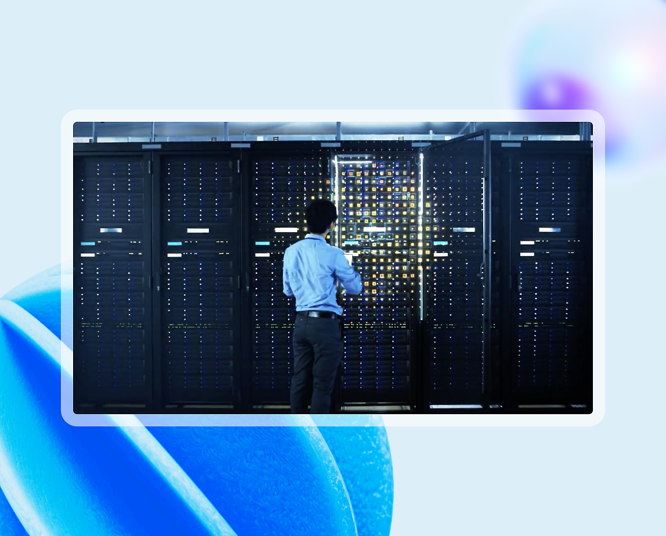 A person checking a server cabinet in a server room