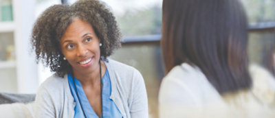 A close-up of a woman smiling.