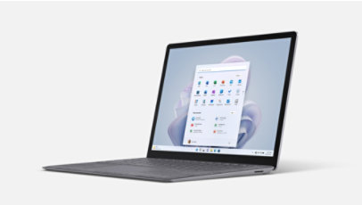 Vista frontal do Surface Laptop 5 na cor platina com uma flor platina no ecrã inicial do Windows 11.