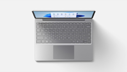 A top-down view of Surface Laptop Go 2 in Platinum features the keyboard.