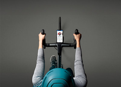 A person on a stationary bike.