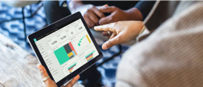 A person holding a tablet