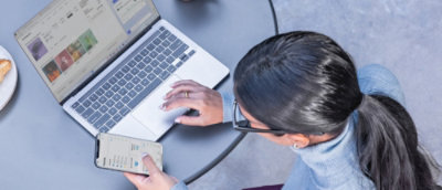 A person typing on a laptop.