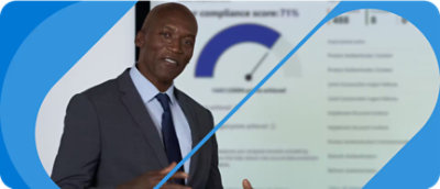 Một người mặc vest và đeo cà vạt