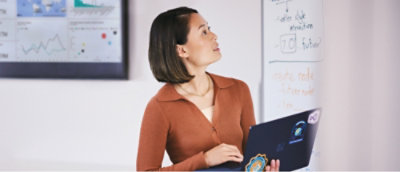 A person holding a computer