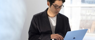 A person looking at a laptop.