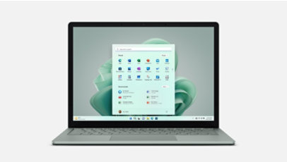 Surface Laptop 5 couleur Vert Sauge : vue de face avec une fleur assortie sur l’écran Démarrer de Windows 11.