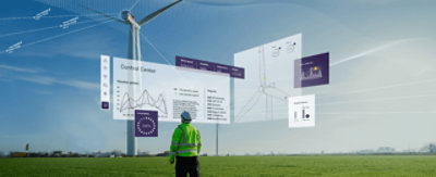 Un trabajador que lleva puesta ropa de protección con neón mirando una turbina eólica y la información se muestra en realidad mezclada sobre la turbina.