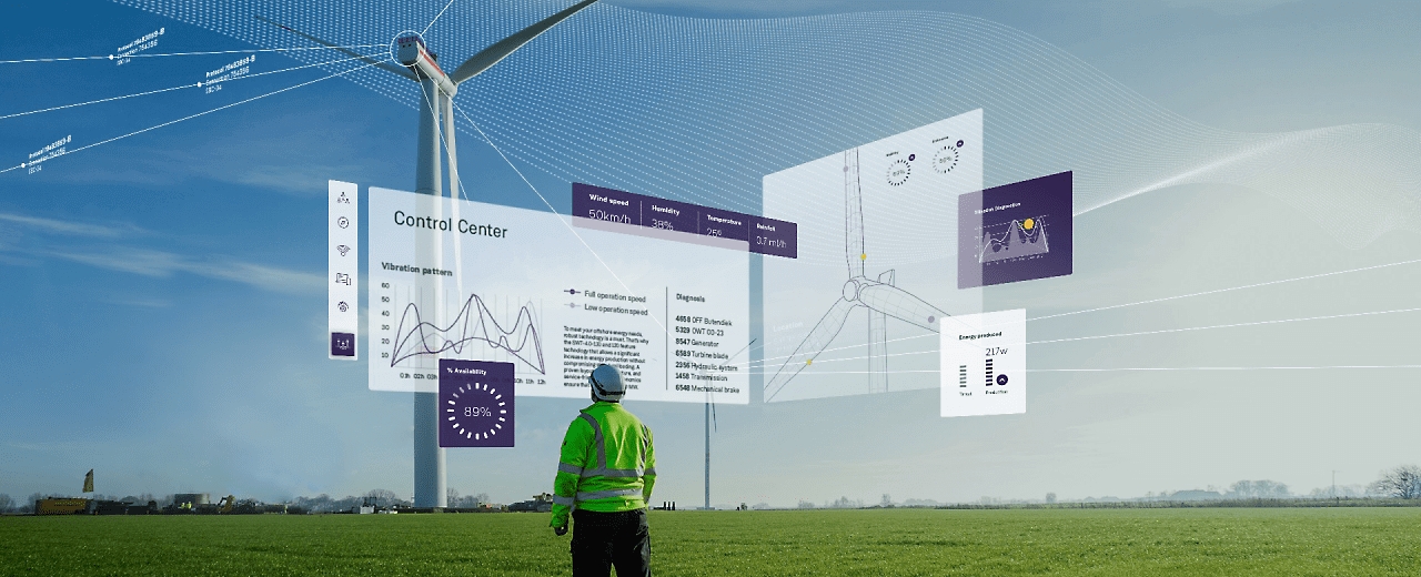 A worker wearing protective neon clothing looking up at a wind turbine and information is being displayed in mixed reality over the turbine.