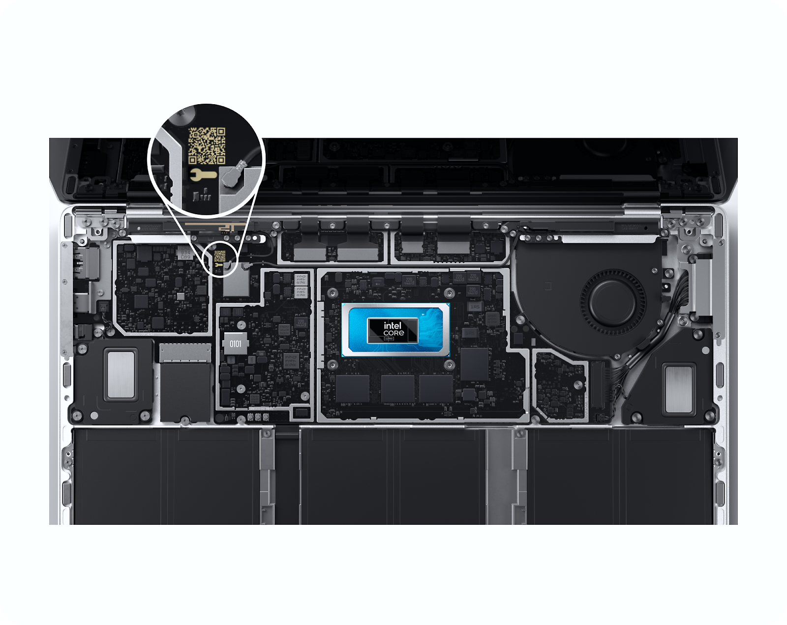 Image showing the internal components of a laptop, including a visible Intel Core chip at the center