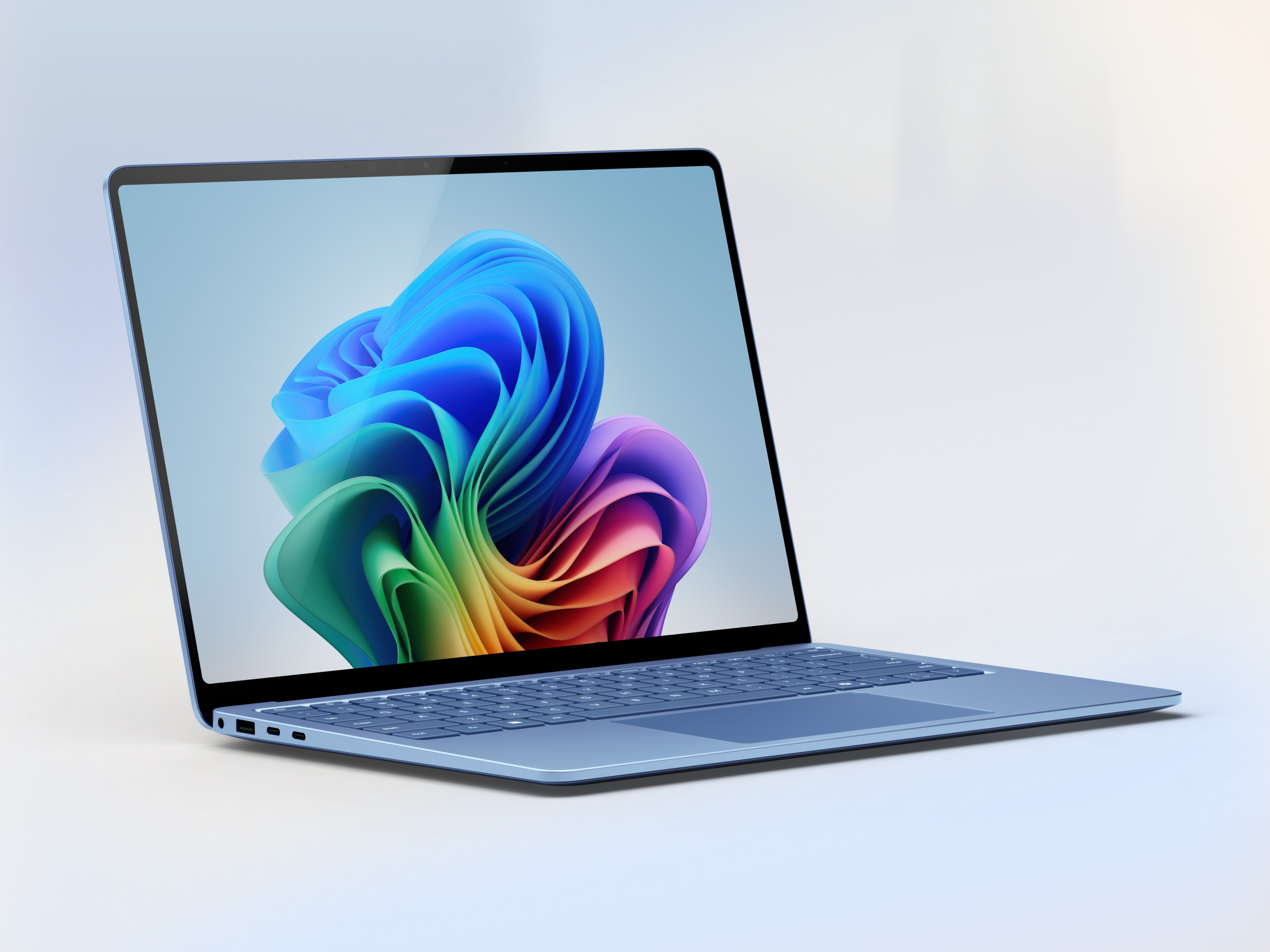 13.8 英寸蓝宝石色 Surface Laptop。