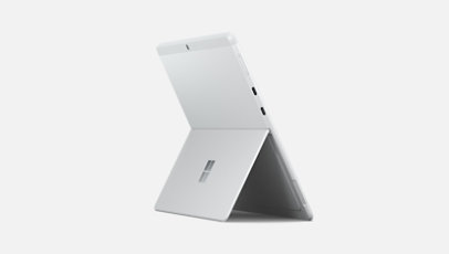 A side view of Surface Pro X as a tablet in kickstand mode.