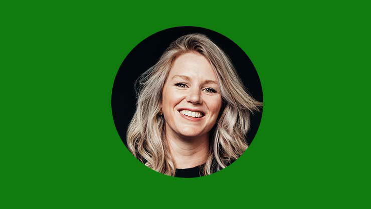 Teri Buckley's headshot on a green background