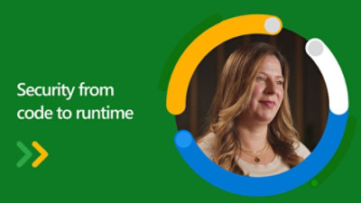 長い波状の髪を持つ室内に座り、カメラから離れた場所を見ている"Karen Dahmen" という名前の女性