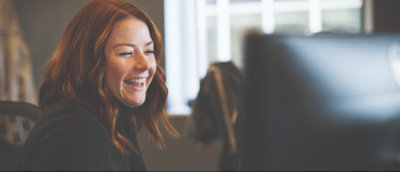 A person smiling at the camera.