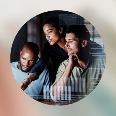A group of people looking at a computer screen.