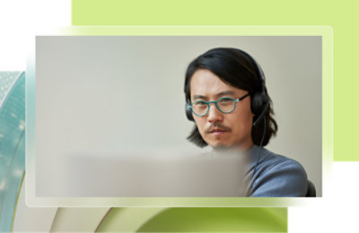 A man wearing glasses and headphones.