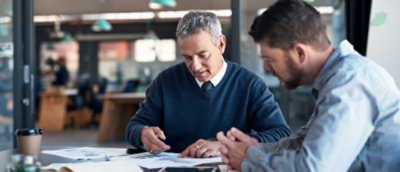 A person looking at a piece of paper.