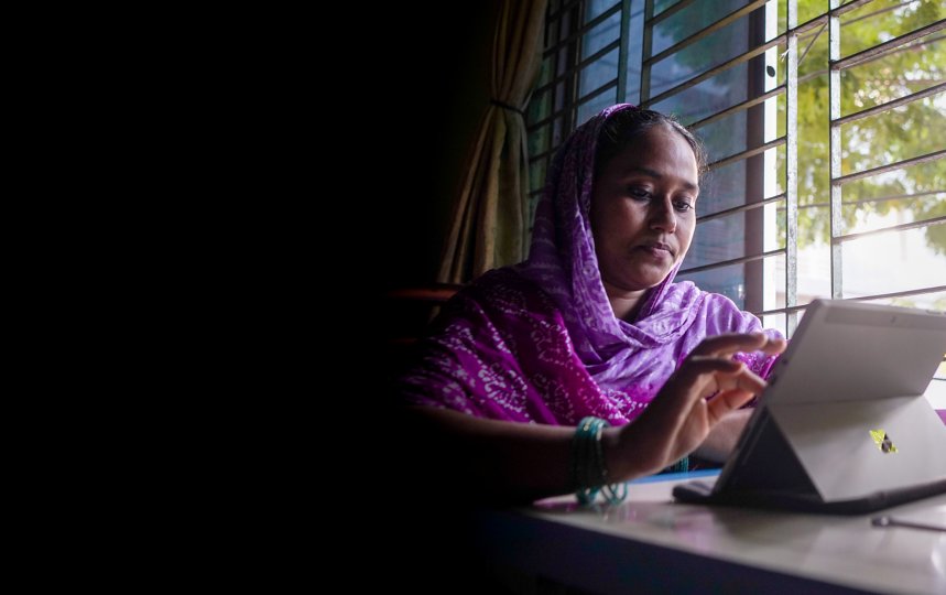 Ruma Akter uses a Surface Pro tablet to learn as part of the Shimmy Technologies up-skilling program.